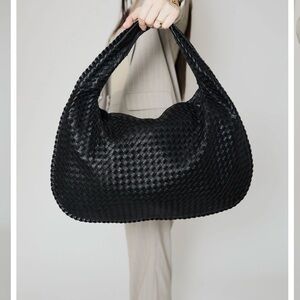 SUPER TRENDY AND IN DEMAND Large Braided Black Vegan Leather Sack Bag